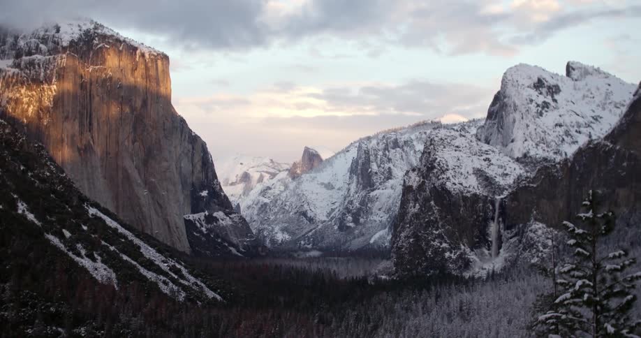Snowy mountains at sunset
