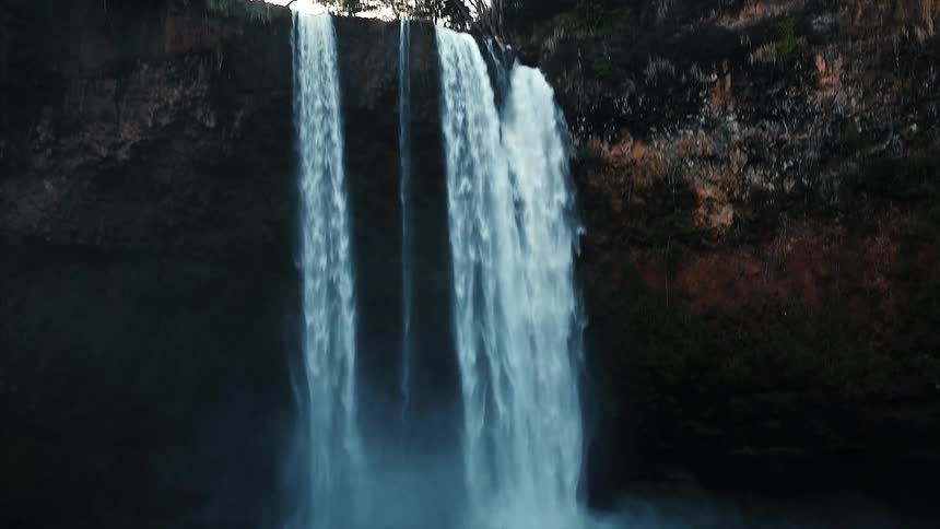 Water falls into a pond