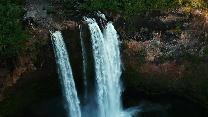 Aerial view of waterfalls  flowing to the basin below