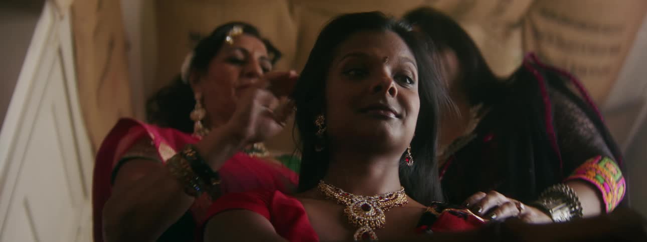 An indian family is getting ready to celebrate the party they are going to