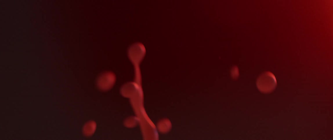 Red liquid bounces in the air