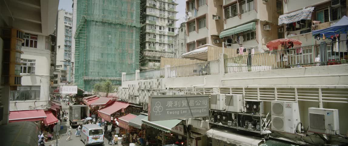 People walking and shopping on a hong kong street