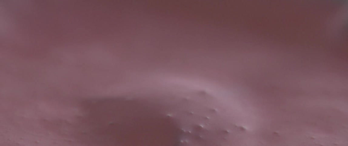 Pink paint shakes and splashes
