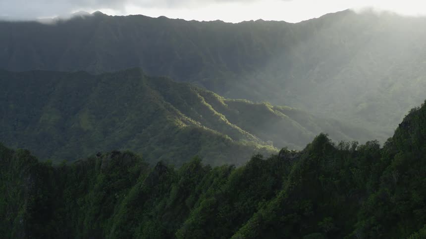 Aerial view of a mountainous area during spring is displayed