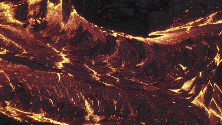 Aerial view of lava and ash is displayed