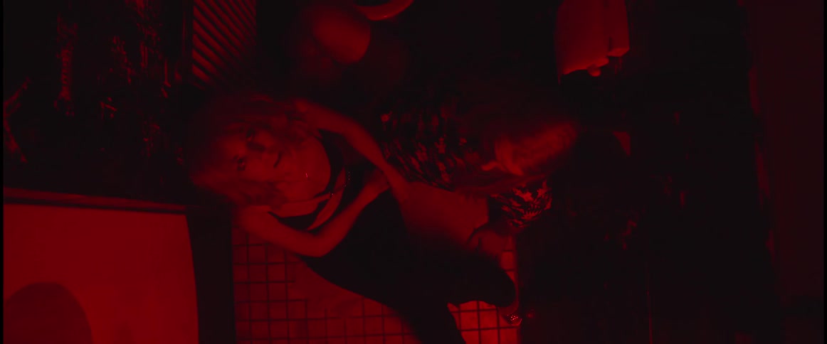 A woman in a red room