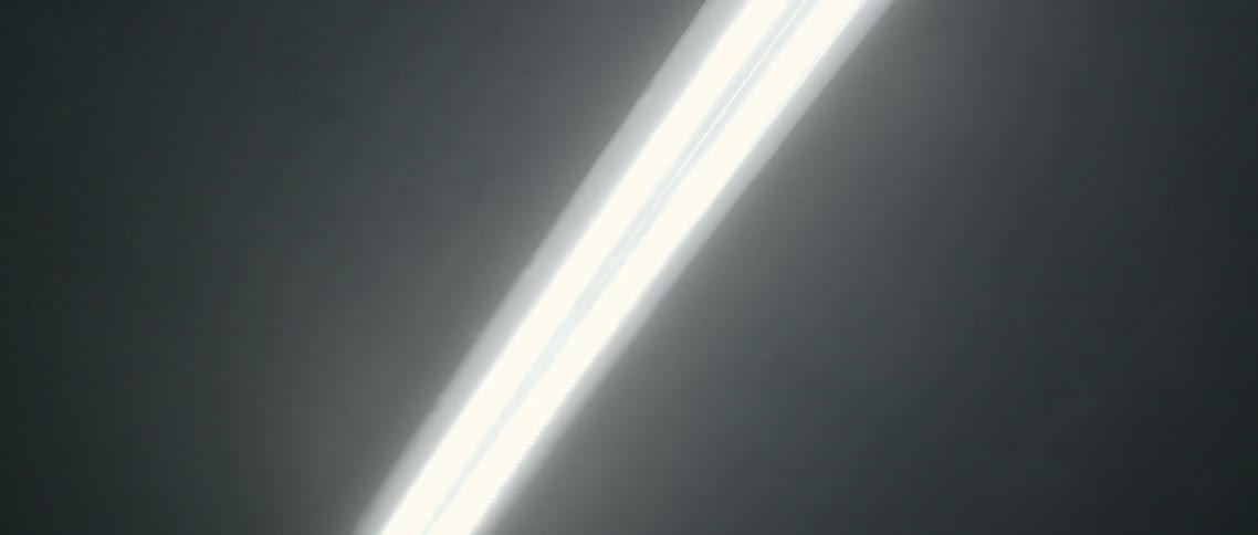 A fluorescent light in a dark room