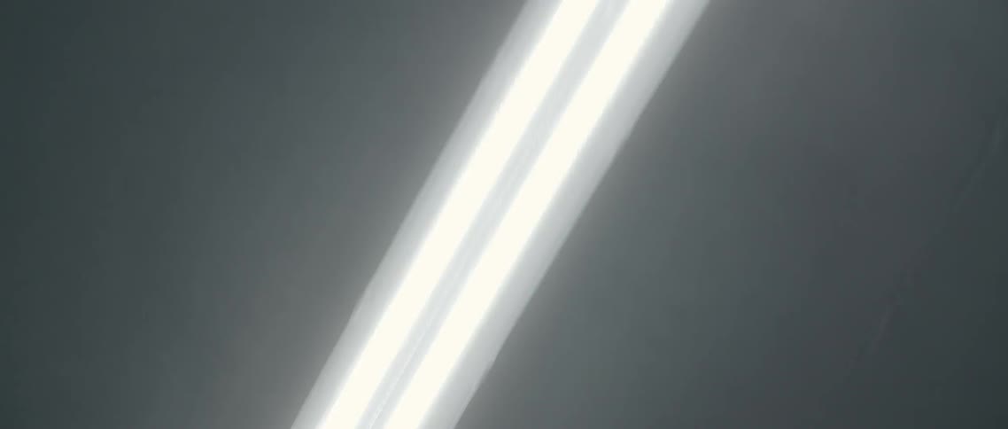 A florescent light in a dark room