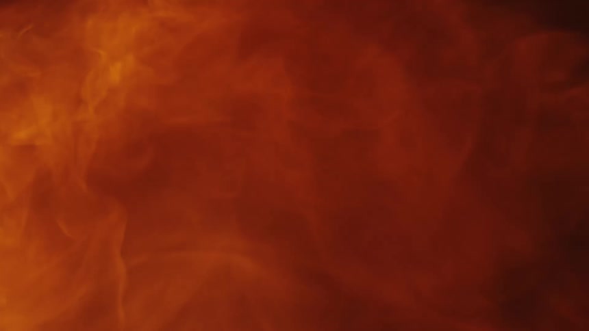 Fire and flames emerge brightly from the darkness