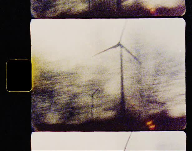 The windmills turn on the field