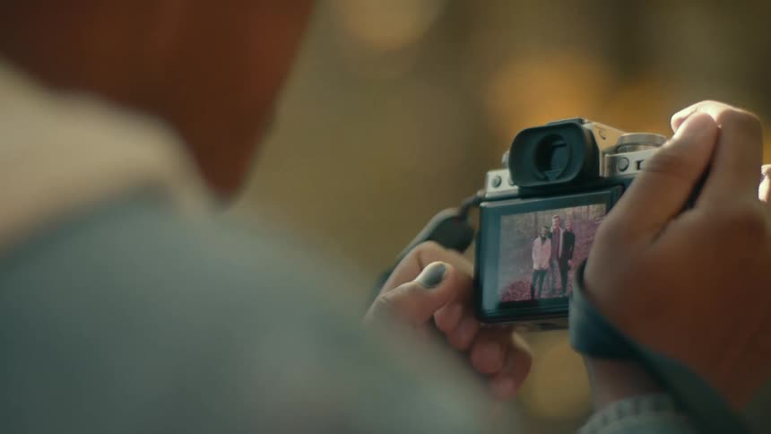 A photographer in a forest