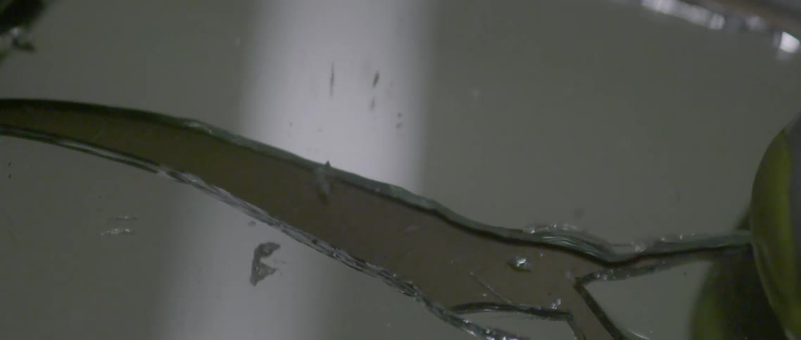 A mirror cracks into many pieces