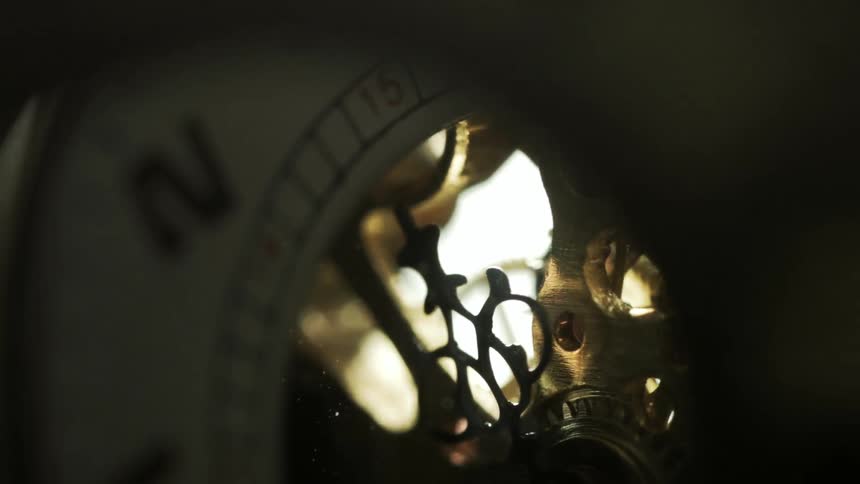 Gears turn in a clock