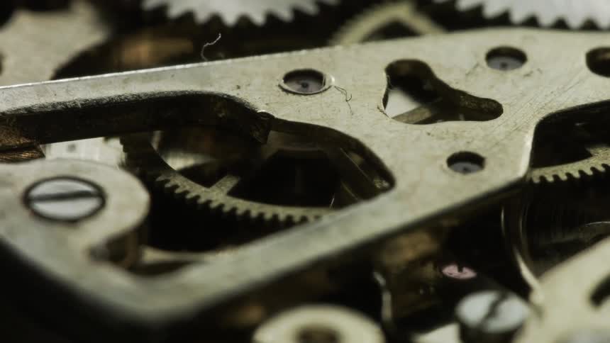 Gears turn in a machine