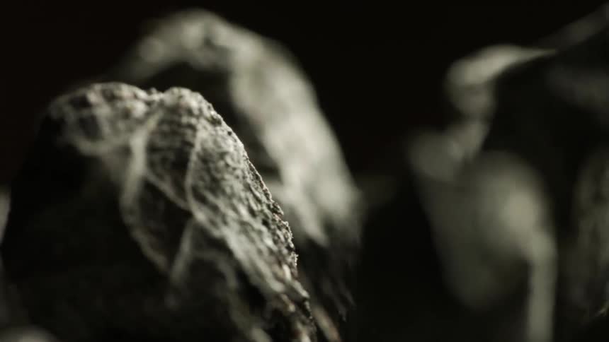 Stone lumps in a dark room