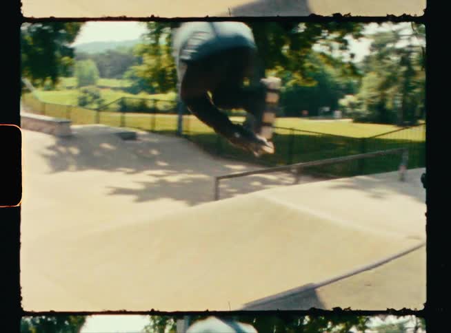 A man jumps on the ramp with his skateboard