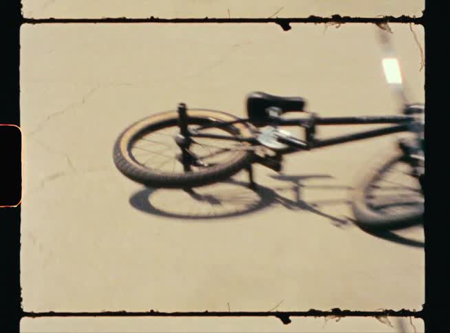 A person does a jump on their bike