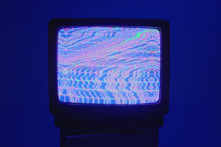 A vintage television is displayed indoors