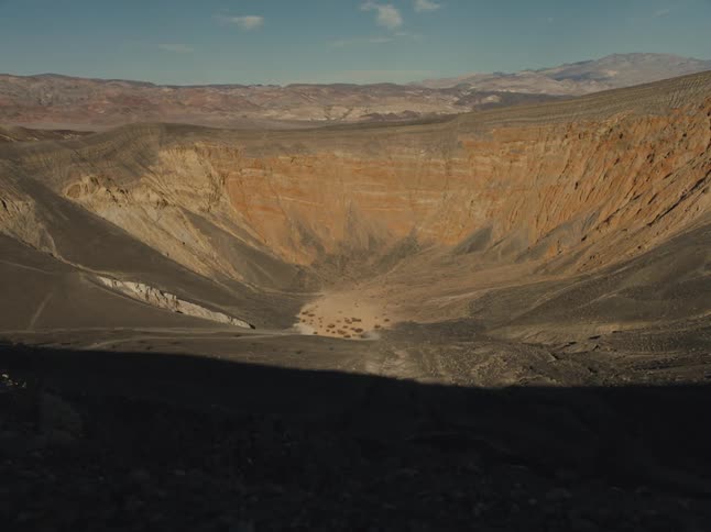 Aerial view of a canyon landscape is displayed