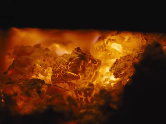 The fire is burning the coals