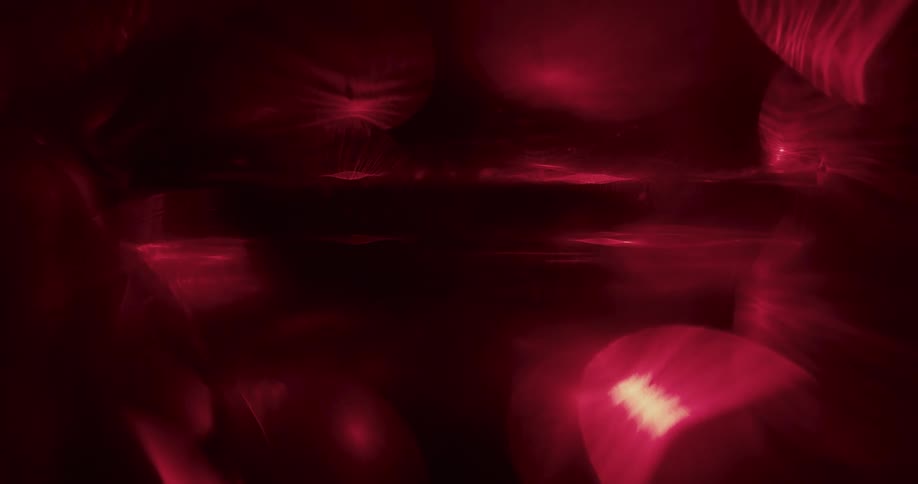Abstract footage of lit up red lights