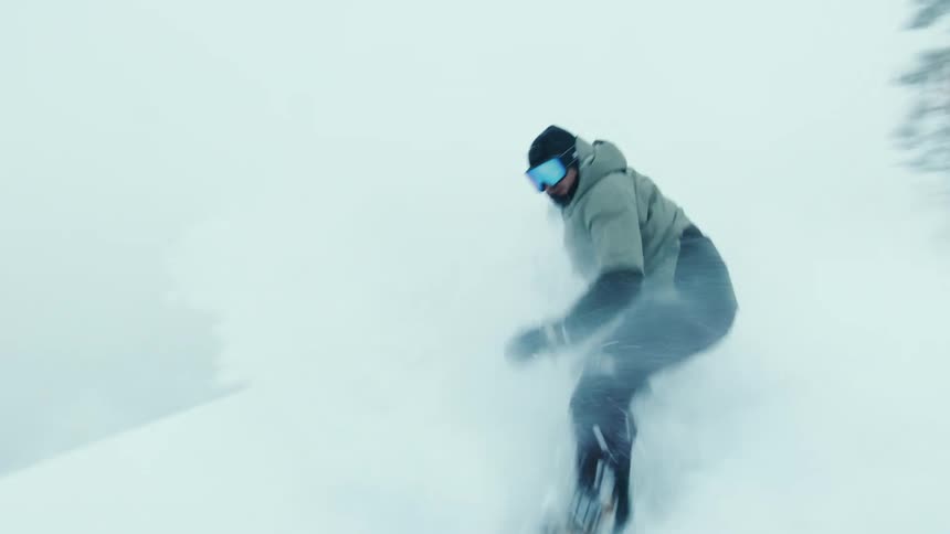 There are people that are snowboarding in the winter time