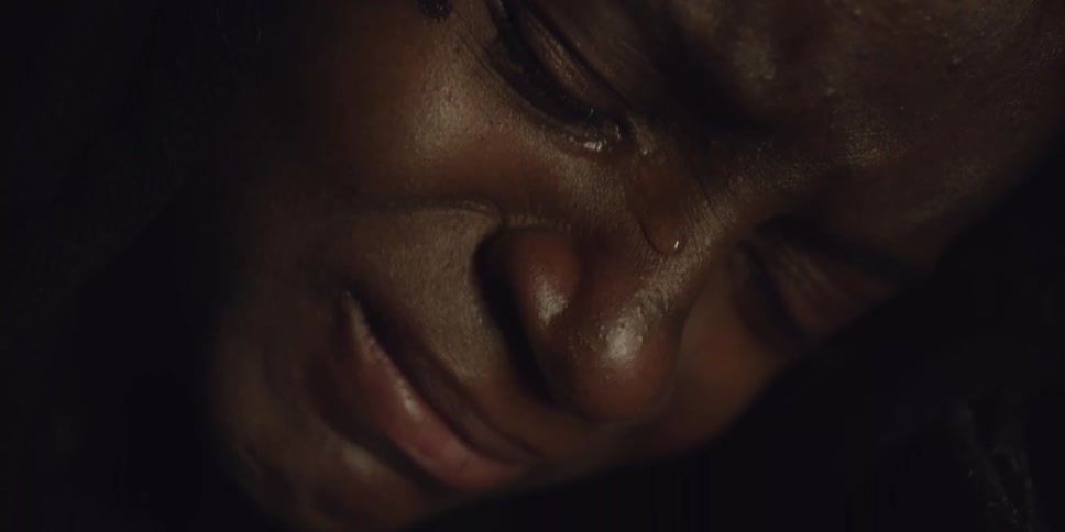 Close up view of a person crying and upset