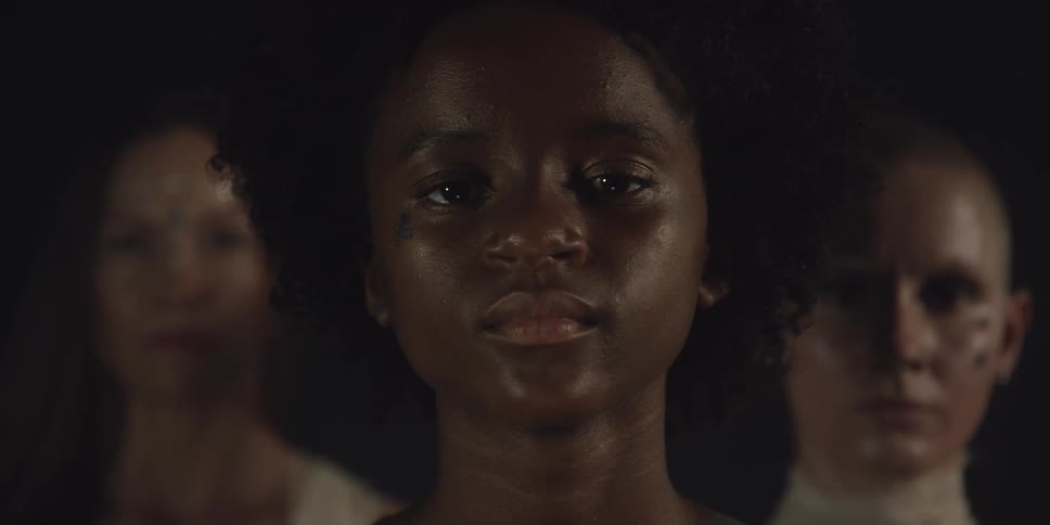 Three females are standing together for the portrait