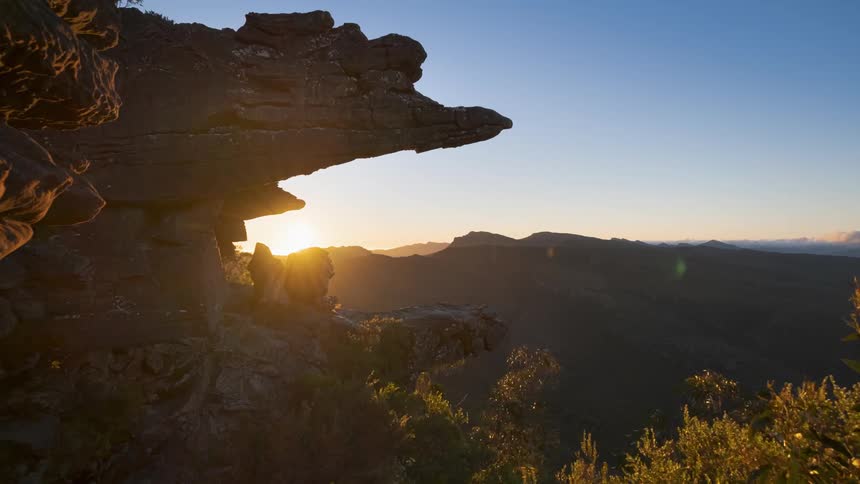 Time lapse view of the sun setting in the horizon