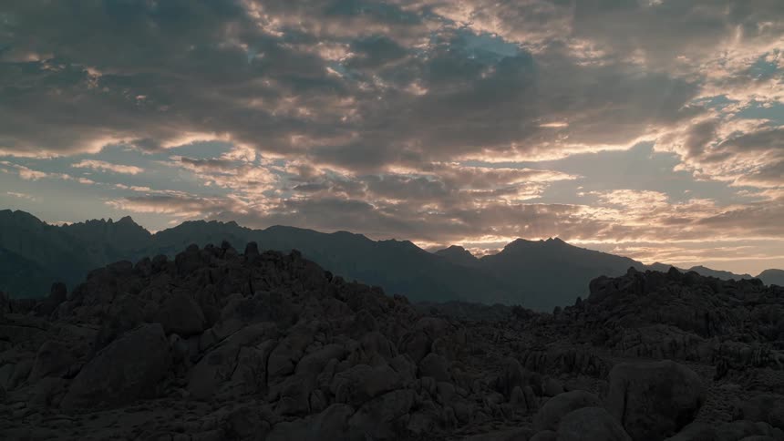 Aerial view of the sun setting in the horizon is displayed