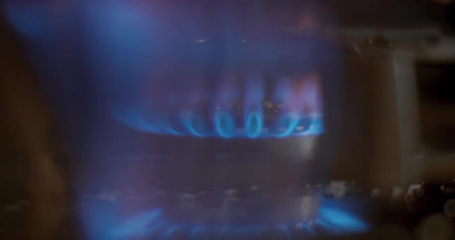 Close up view of a gas lit stove