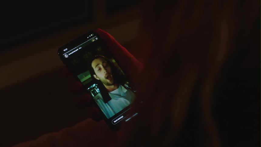 One person listens to man on video call as he talks and gestures