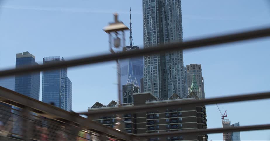 Moving towards downtown the skyscrapers stand tall in the clear blue sky