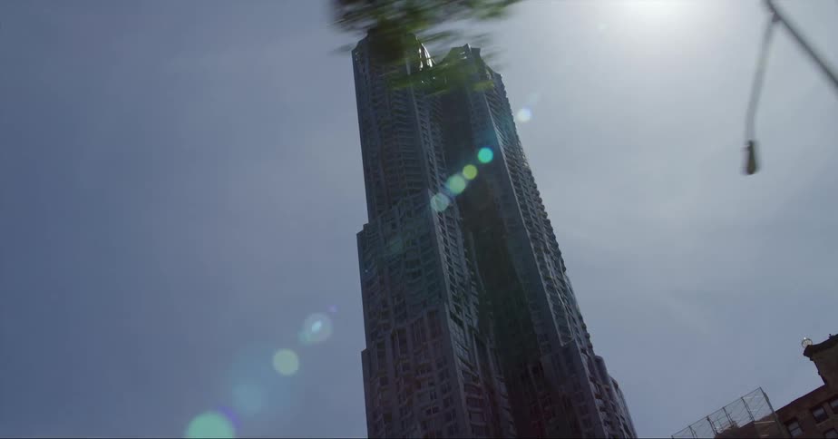 A view of a building in a downtown city is displayed