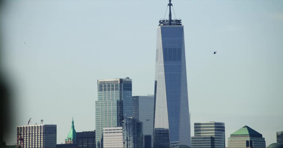 A bus passes by the skyline