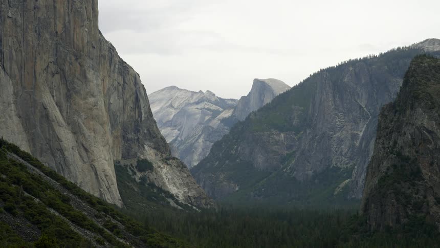 Aerial view of a mountain landscape is displayed