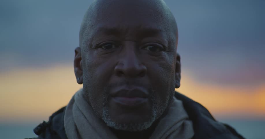 Close Portrait of a black male at sunset