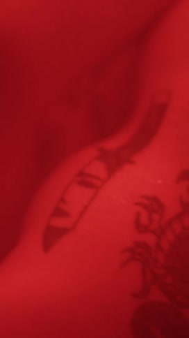 A persons arm is covered in tattoos
