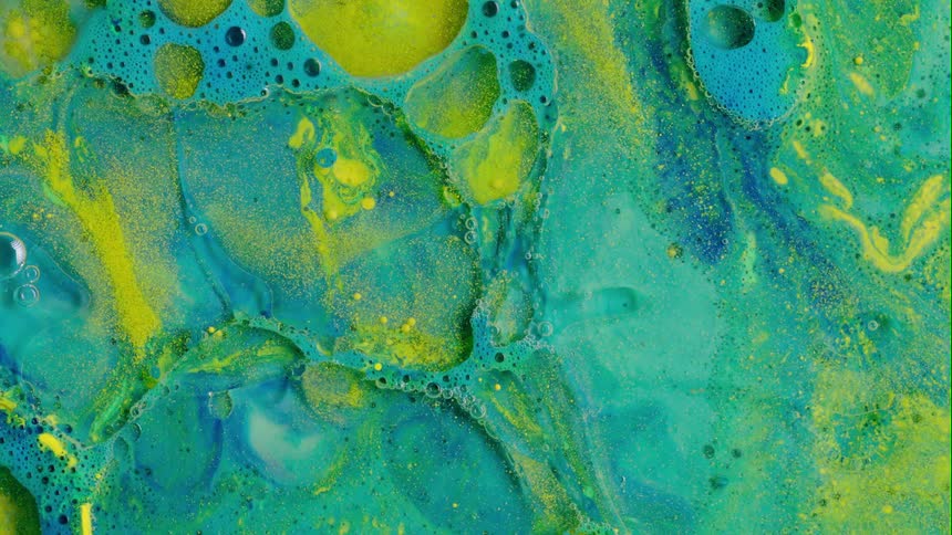 Paint colors are being mixed together