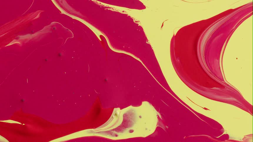 Water runs on pink and yellow colored surface