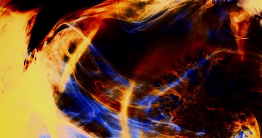 A yellow and orange organic substance ripples and moves as a blue wisp moves over the environment
