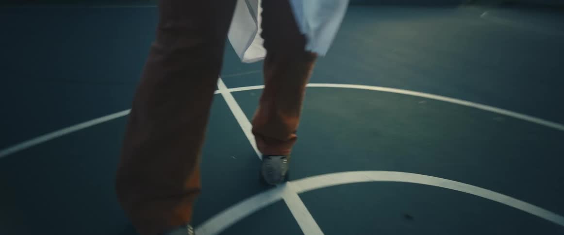 A person is dancing on roller skates