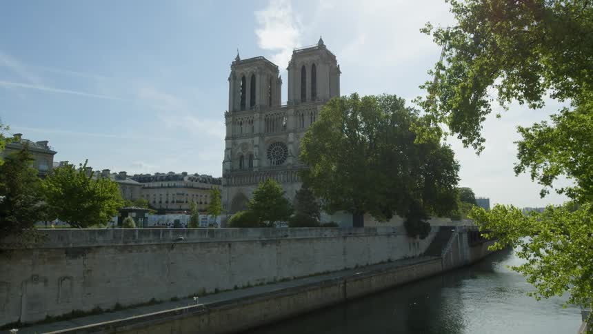 A large building is by the canal