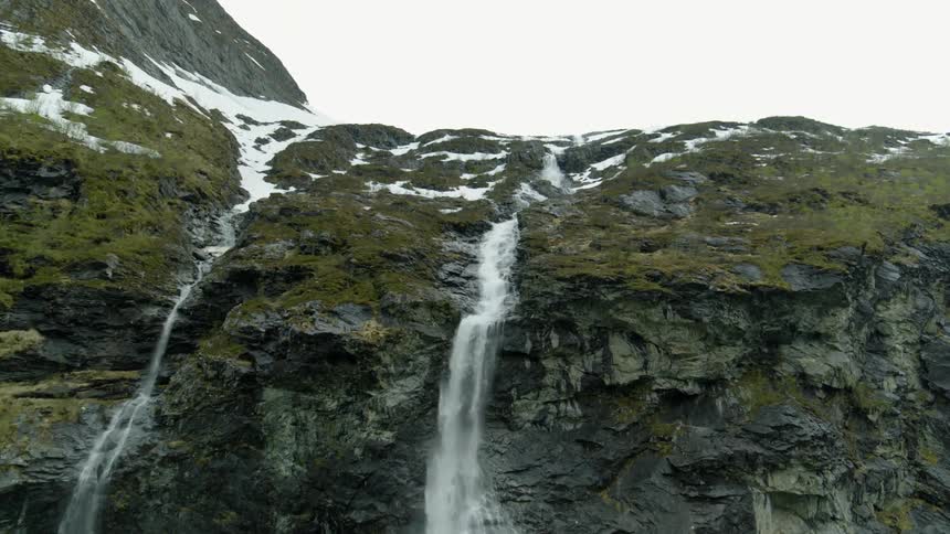 An aerial view of a waterfall in Norway