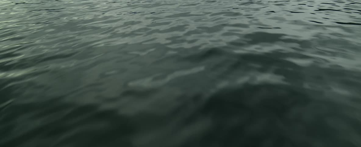 Drone shot of Norwegian fjord flying over water