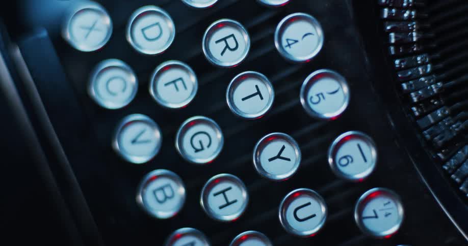 Light shines on the keys of an old typewriter