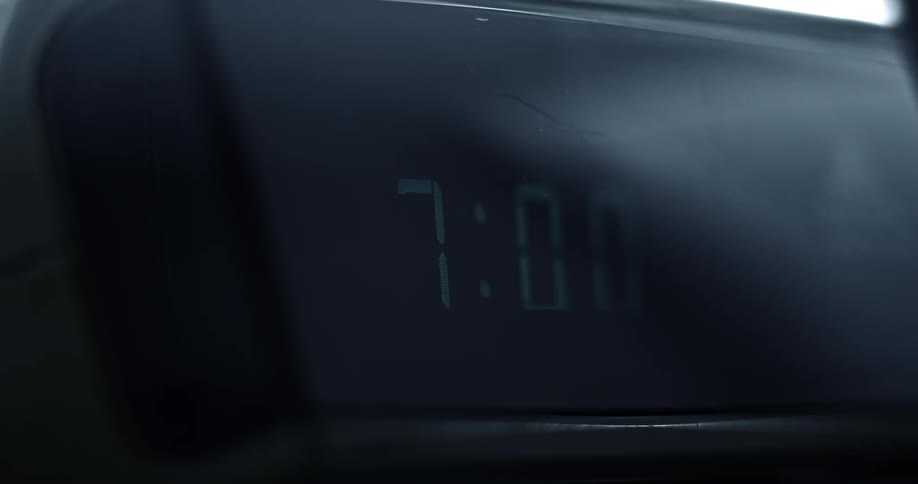 The numbers on a digital clock change from 659 to 700