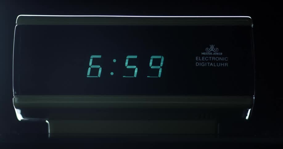 Close up of digital clock striking seven