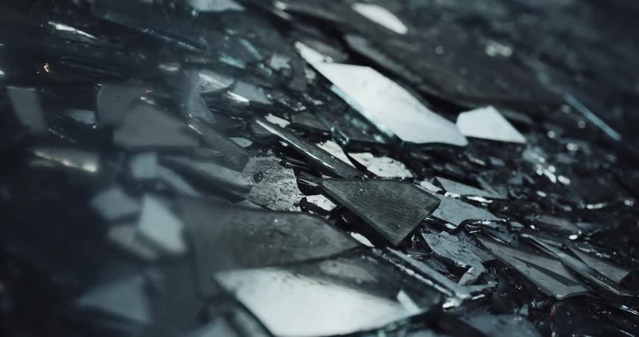 Shards of broken glass and metal debris