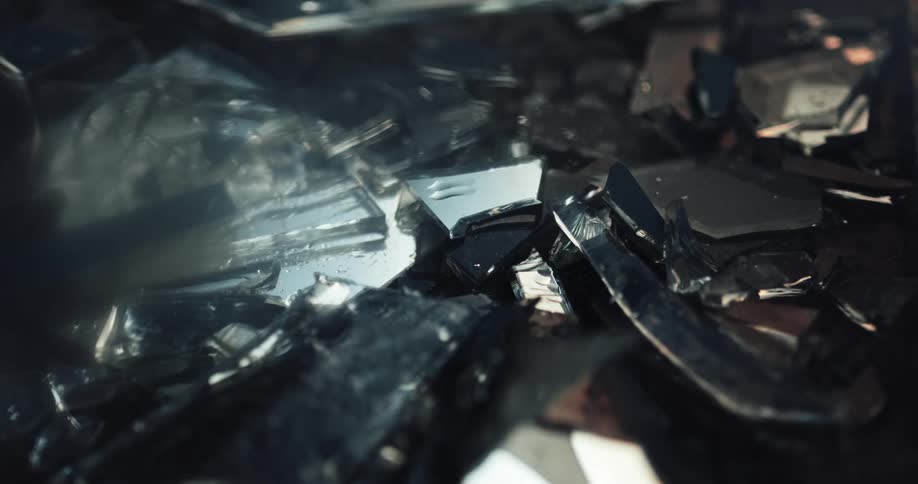 Broken scraps of metal sit in a pile